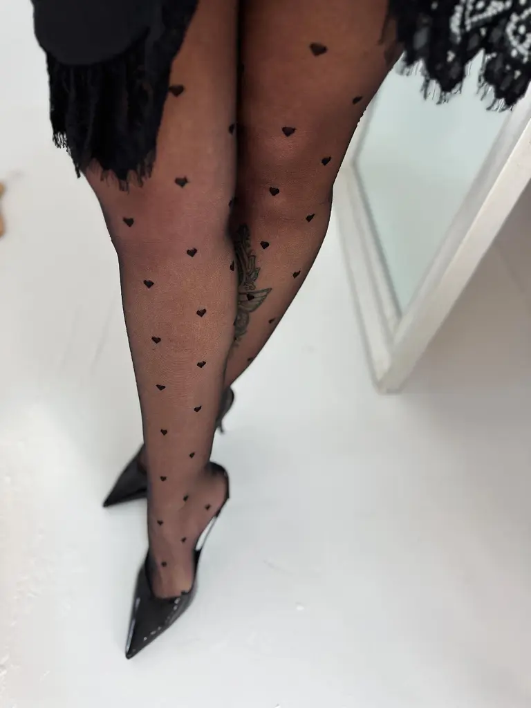 Vzorované čierne pančuchové nohavice - next